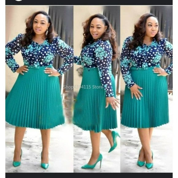 Elegant Pleated Teal Midi Dress with Polka Dotted pattern and front tie bow - Picture 1 of 8